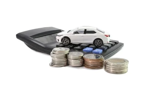 Coins stack with Calculator and car , concept Saving money for car Foto stock