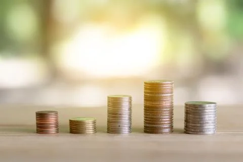 Coins stack of coins saving money and income or investment ideas and financ.. Stock Photos