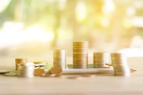 Coins stack of coins saving money and income or investment ideas and financ.. Stock Photos