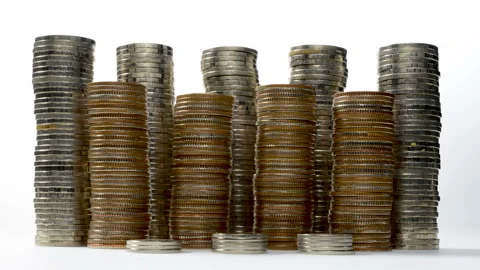 Coins on stack decreasing on white background - stop motion Stock Footage 141975670