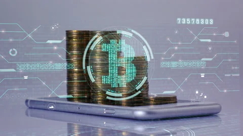 Coins stack increase on smart phone with business data hologram. Stock Footage 232465227