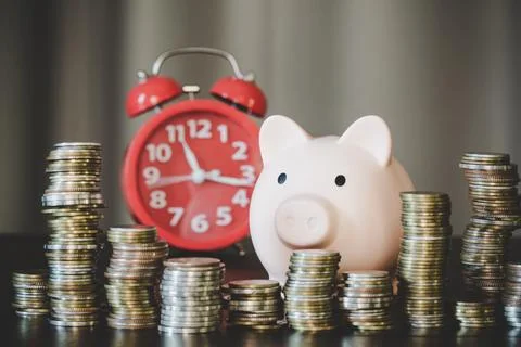 Coins stack for money saving Stock Photos