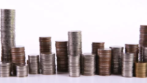 Coins on stack on white background Video stock 145189110