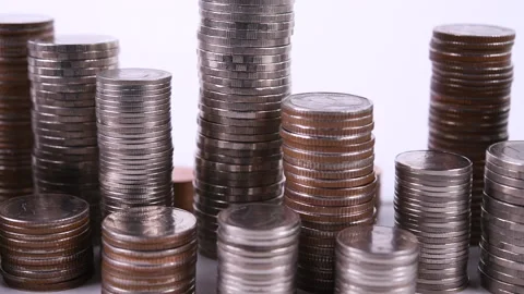Coins on stack on white background Видео 145192684