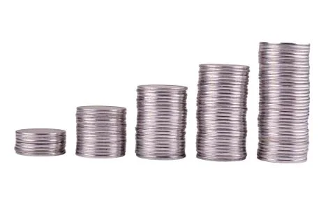 Coins stacked on increasing Stock Photos