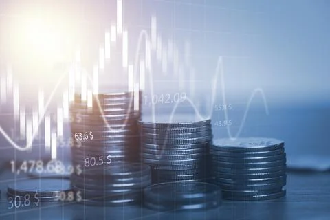 Coins stacking and technical chart graph for stock market investment Stock Photos