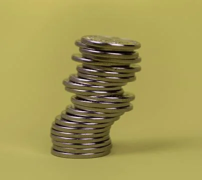 Coins in stacks on a uniform background Stock Photos