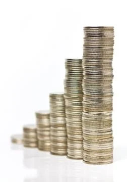 Coins stacks on white background, increasing business Stock Photos