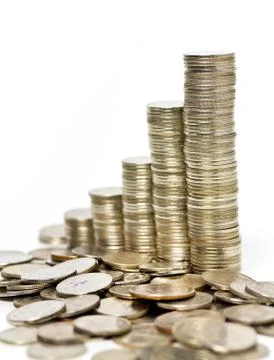Coins stacks on white background, increasing business Stock Photos