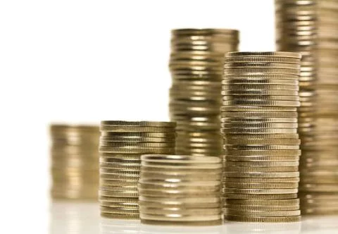 Coins stacks on white background, increasing business Stock Photos