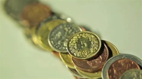 Coins wall on the table. Slider, close up shot. Video stock 32421268