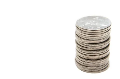 Coins on the white background Stock Photos