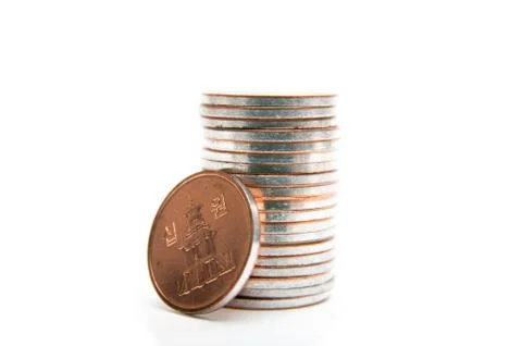 Coins on the white background Stock Photos