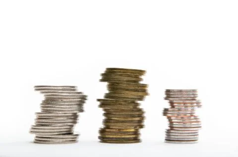 Coins on the white background Stock Photos