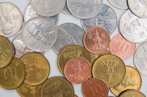 Coins on the white background Stock Photos