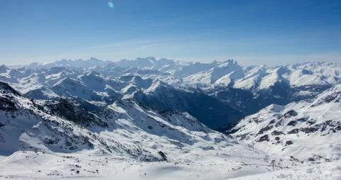 Col de thorens peclet val thorens valley view sun snowy mountain landscape Fr Stock Photos