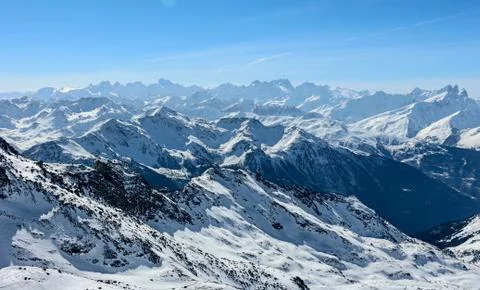 Col de thorens peclet val thorens valley view sun snowy mountain landscape Fr Stock Photos
