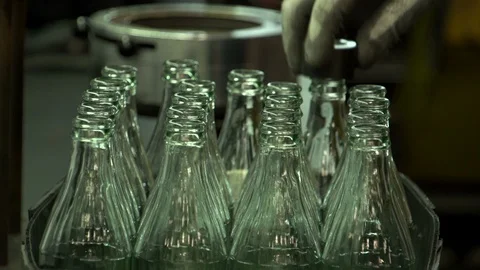 Cola bottle glass manufacturing industrial factory. Empty transparent bottles Video stock 115485053