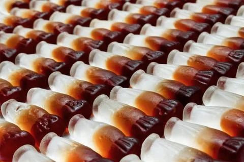 Cola bottles row Stock Photos