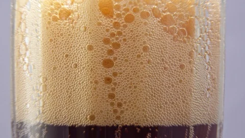 Cola bubbles in a glass close up Stock Footage 122943895