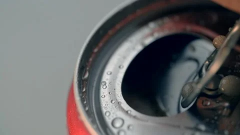 Cola can is opened in slow motion. Macro shot of the opening of the drink in can Stock Footage 167020485
