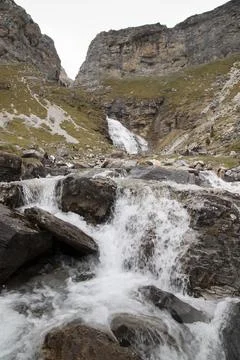 Cola de caballo waterfall cascading in ordesa national park Stock Photos