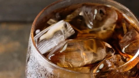 Cola drinks in a glass with ice. Stock Footage 92927729