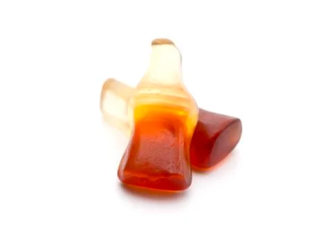 Cola Flavored Gummies on a White Background Stock Photos