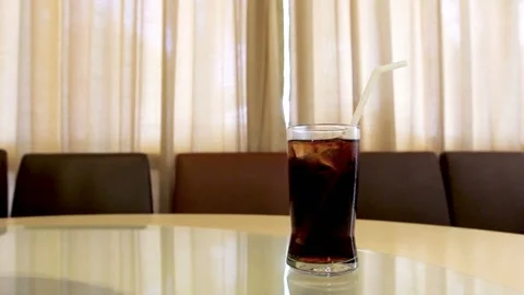 Cola in glass with motion background Stock Footage 227119199