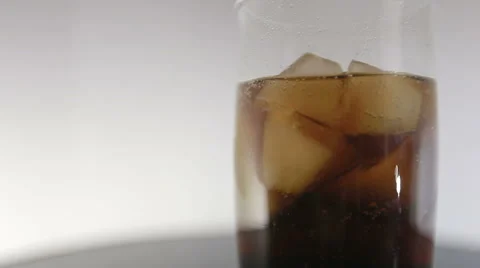 Cola with Ice and bubbles in glass. Stock Footage 61447504