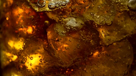 Cola with ice cubes and bubbles in glass Stock Footage 59912580