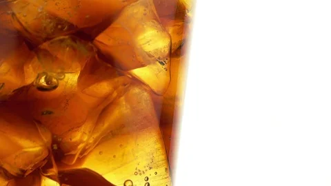 Cola with Ice Cubes and Bubbles in Glass. Stock Footage 76004043