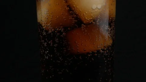 Cola with ice cubes close up Stock Footage 106514066