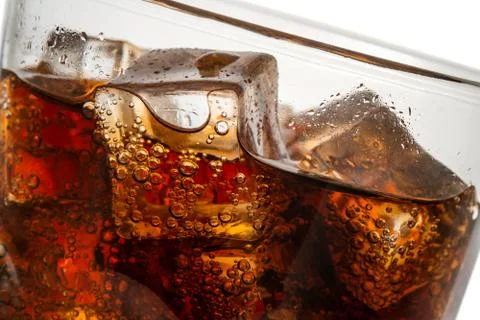 Cola with ice cubes close up Stock Photos