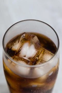 Cola with ice cubes Stock Photos