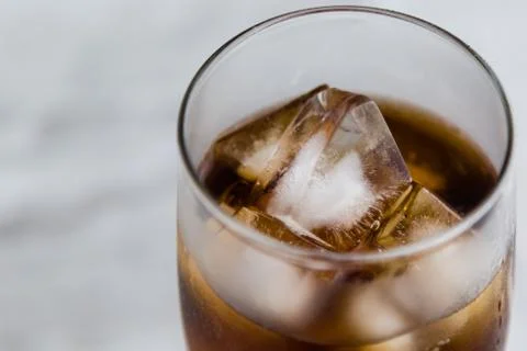 Cola with ice cubes Stock Photos