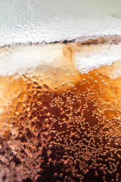 Cola with ice cubes Stock Photos