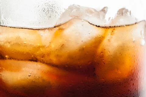 Cola with ice cubes Stock Photos