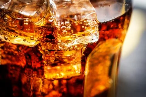 Cola with ice cubes Stock Photos