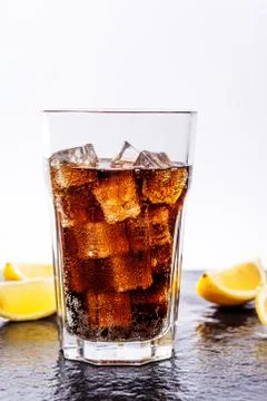 Cola with ice cubes Stock Photos