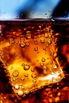 Cola with ice cubes Stock Photos