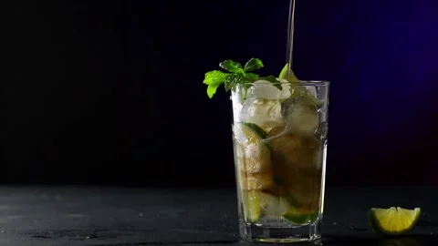 Cola is poured into a glass Stock Footage 220596404