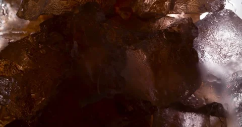 Cola is pouring and foaming slow motion macro Stock Footage 124787111