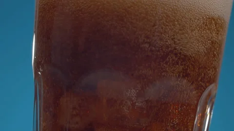Cola pouring into a glas Stock Footage 153828801