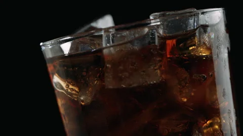 Cola Soda with Ice Cubes in Glasses, Close Up on Black Background Stock Footage 346088490