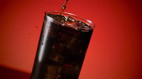 Cola Soda Splashing in Ice Stock Footage 63753583