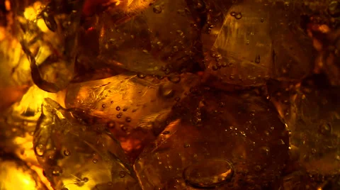 Cola soft drink bubbles &amp; ice, close-up Stock Footage 59961755