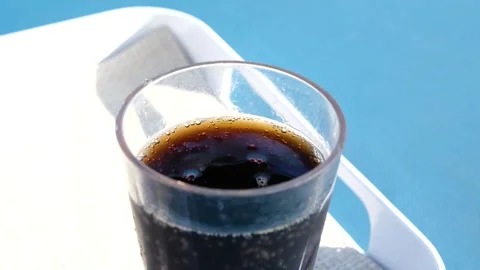 Cola soft drink with ice cubes, Close up of soda fizzy drink in Cold glass Stock Footage 316238056