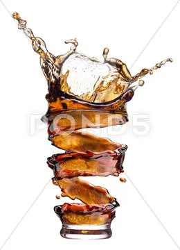 Cola splash isolated on white Stock Photos