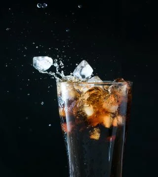 Cola splash Stock Photos